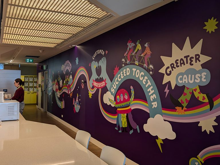Large format wall print signage installation
