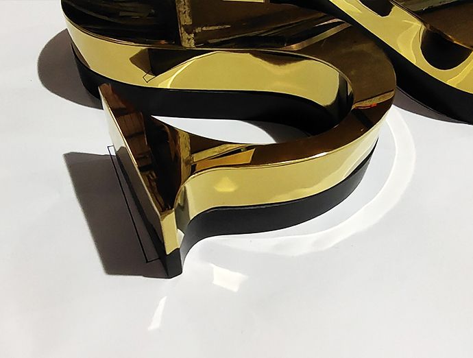 Illuminated 3D fabricated signage (building)
